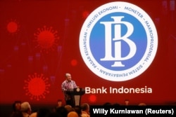 Gubernur Bank Indonesia Perry Warjiyo berbicara dalam pertemuan tahunan dengan pemangku kepentingan keuangan di Jakarta, 30 November 2022. (Foto: REUTERS/Willy Kurniawan)