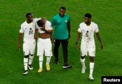 Jwe seleksyon nasyonal Ghana yo apre match Gwoup H yo a kont Urugwe, nan Mondyal Foutbol Qatar la, 2 Desanm, 2022.