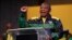 In this file photo taken on July 29, 2022, South Africa's President Cyril Ramaphosa addresses Africa National Congress delegates at the National Recreation Center Johannesburg during the party's National Policy Conference.  Ramaphosa was in talks with Sou