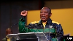 FILE - In this photo taken on July 29, 2022, South Africa's President Cyril Ramaphosa addresses Africa National Congress delegates at the National Recreation Center in Johannesburg during the party's National Policy Conference. 