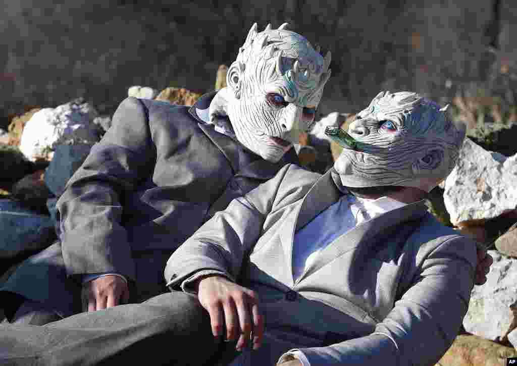 Masked revelers take part in the carnival parade in the village of Vevcani, in the southwestern part of North Macedonia.
