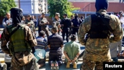 Members of the security forces kick off Christmas Eve with a military operation against drug traffickers where they detained suspected criminals in El Salvador's capital, according to government information, in San Salvador, El Salvador, Dec. 24, 2022.