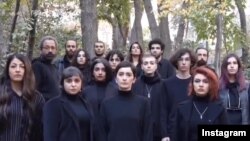 A screenshot from video posted on Instagram by Iranian actress Soheila Golestani shows her, front row-center, and colleagues challenging Iran's headscarf mandate for women.