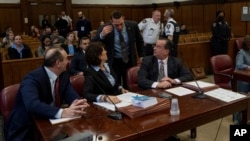 Prosecuting and Defense attorneys wait during the sentencing of the Trump Organization at Manhattan Criminal Court on Friday, Jan. 13, 2023, in New York.