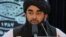FILE - Taliban spokesman Zabihullah Mujahid speaks during a press conference in Kabul, Nov. 5, 2022.