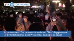 VOA60 World - China Strengthens Police Presence in Response to Protests