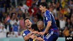 2022年世界杯賽事上，日本隊迎戰克羅地亞時，日本球員慶祝一次進球（2022年12月5日）