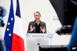 French Prime Minister Elisabeth Borne delivers her speech during a press conference in Paris, Jan. 10, 2023.
