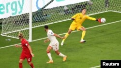 Tunisia's Aymen Dahmen makes a save during Group D World Cup match against Denmark at Education City Stadium, Al Rayyan, Qatar on November 22, 2022.