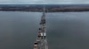 General view of the damaged Antonivsky Bridge in Kherson, Ukraine, Nov. 27, 2022. The bridge, the main crossing point over the Dnipro river in Kherson, was destroyed by Russian troops in earlier November, after Kremlin's forces withdrew from the southern city.