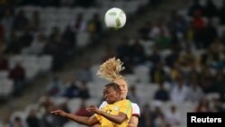 FILE: Women's First Round - Group F Zimbabwe v Germany - Corinthians Arena - Sao Paulo, Brazil - 03/08/2016. Kudakwashe Bhasopo (ZIM) of Zimbabwe and Leonie Maier (GER) of Germany in action. REUTERS/Paulo Whitaker
