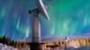 (FILE) Auroral activity above antenna field at Finnish Meteorological Institute's Arctic Space Center in Sodankyla, Finland, on March 16, 2017. 