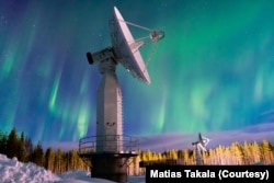 Auroral activity above antenna field at Finnish Meteorological Institute's Arctic Space Center in Sodankyla, Finland, is seen in this photo taken by Matias Takala on March 16, 2017.
