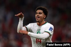 L'attaquant marocain Zakaria Aboukhlal célèbre après avoir inscrit le deuxième but de son équipe face à la Belgique, le 27 novembre 2022 durant la Coupe du monde au Qatar.