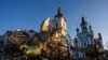 A cupola lies on the ground in front of the Orthodox Church which was destroyed by Russian forces in the recently retaken village of Bogorodychne, Ukraine, Jan. 7, 2022.