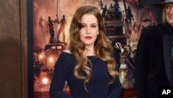 FILE - Lisa Marie Presley arrives at the Los Angeles premiere of "Mad Max: Fury Road" at the TCL Chinese Theatre on May 7, 2015. Presley died Jan. 12, 2023, after a hospitalization, her mother said. She was 54.