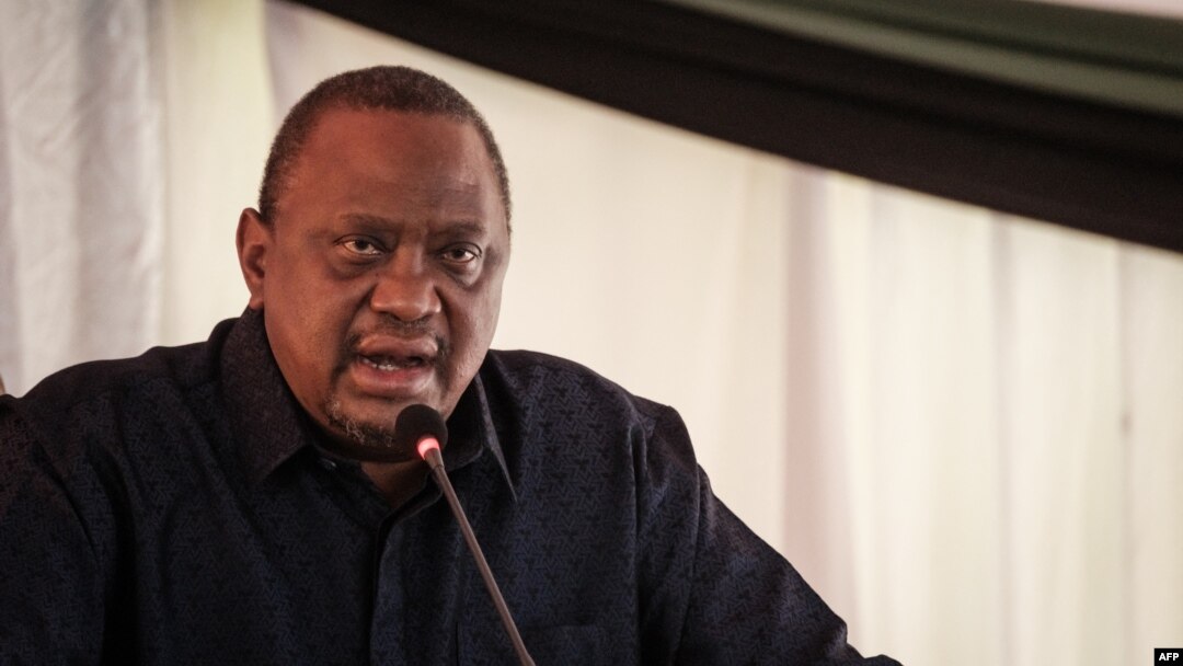Former Kenya's President Uhuru Kenyatta speaks during the East African Community-led Nairobi Process, the third peace talk on the eastern region of Democratic Republic of Congo, in Nairobi on Nov. 30, 2022.