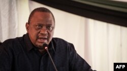 Former Kenya's President Uhuru Kenyatta speaks during the East African Community-led Nairobi Process, the third peace talk on the eastern region of Democratic Republic of Congo, in Nairobi on Nov. 30, 2022.