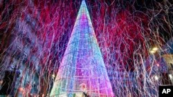 Local authorities inaugurate the Christmas lighting in the streets of Vigo, Spain, Nov. 19, 2022.