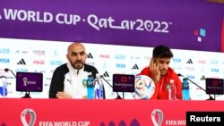 Morocco's coach Walid Regragui and player Munir El Kajoui give a press conference on their upcoming World Cup clash against Spain