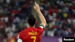 Portugal's Cristiano Ronaldo celebrates scoring his first goal in the match-up against Ghana at Stadium 974 in Doha, Qatar on November 24, 2022 