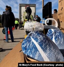 These turkeys from St. Mary’s Food Bank in Phoenix, Arizona are being distributed in a rural area in northern Arizona, Nov. 16, 2022