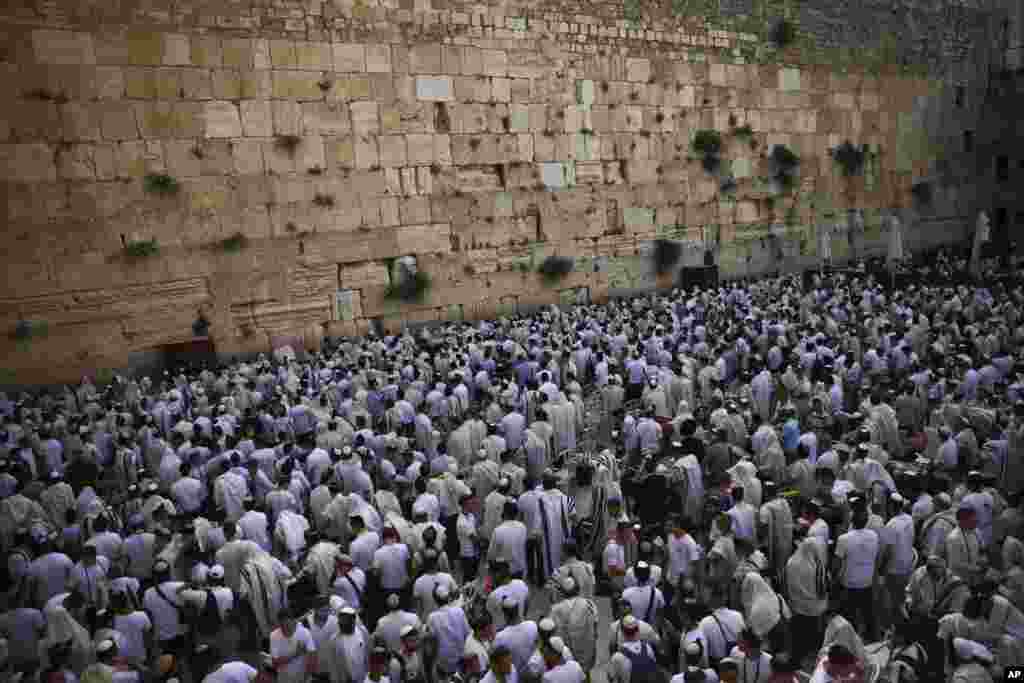 Jewish men during &quot;Jerusalem Day,&quot; an Israeli holiday celebrating the capture of the Old City during the 1967 Mideast war, at the Western Wall, the holiest site where Jews can pray in the Old City of Jerusalem.