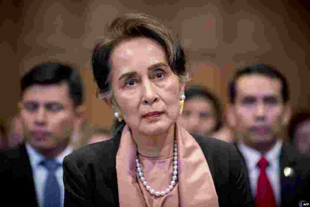 A handout photo released on December 10, 2019 by the International Court of Justice shows Myanmar's State Counsellor Aung San Suu Kyi attending the start of a three-day hearing on the Rohingya genocide case before the UN International Court of Justice at