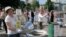 FILE - Protesters, critical of the government's handling of the economy, are seen banging on empty barrels as they rally in downtown in Kyiv, Ukraine, May 21. 2015.