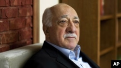 FILE - In this March 15, 2014, file photo, Turkish Islamic preacher Fethullah Gulen is pictured at his residence in Saylorsburg, Pa. Gulen is charged in Turkey with plotting to overthrow the government in a case his supporters call politically motivated. 