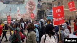 FILE - Demonstrators protest police killings and brutality, in the Mathare slum in Nairobi, Kenya, June 8, 2020. A murder trial began Oct. 24, 2022, for four officers from a now-disbanded Special Services Unit accused of killings and disappearances.