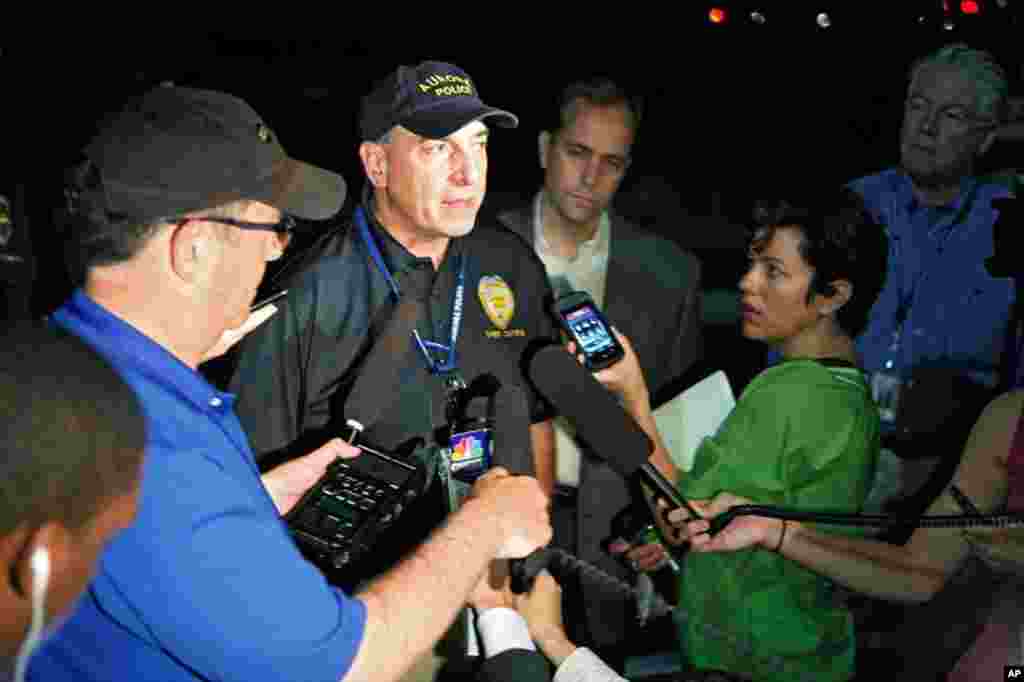 Aurora Police Chief Daniel Oates talks to media at Aurora Mall where as many as 14 people were killed and many injured at a shooting at the Century 16 movie theater, July 20, 2012. 