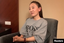 澳大利亚华裔杨恒均的妻子袁小靚在上海接受路透社的采访。（2020年10月19日）