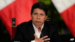 FILE - Peru's President Pedro Castillo attends a press conference at the Presidential Palace in Lima, Peru, Oct. 11, 2022.