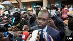 FILE - Ousmane Sonko, president of the opposition party Senegalese Patriots for Work, Ethics and Brotherhood (PASTEF), gives a press statement, in Ziguinchor, Senegal, July 3, 2022. 