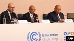 UN's climate change Communications Officer Alexander Saier, UN's climate change executive secretary Simon Stiell, and COP27 President Sameh Shoukry listen to questions following the opening ceremony of COP27 in Sharm El Sheikh, Egypt, November 6 2022. (AFP) 