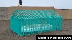 This handout photograph taken on Nov. 6, 2022 and released by the Taliban Government shows the tomb of late Afghan Taliban leader Mullah Omar at Omarzo in Suri district of Zabul province. (Photo by Taliban Government/AFP)