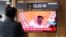 A TV screen showing a news program reporting about North Korea's missile launch with file footage of North Korean leader Kim Jong Un is seen at the Seoul Railway Station in Seoul, South Korea, Nov. 3, 2022.
