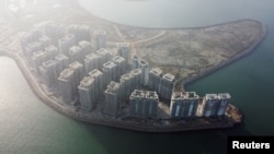 恆大集團在中國海南省人工島嶼海花島上建造的39座高層住宅樓。 （2022年1月7日）