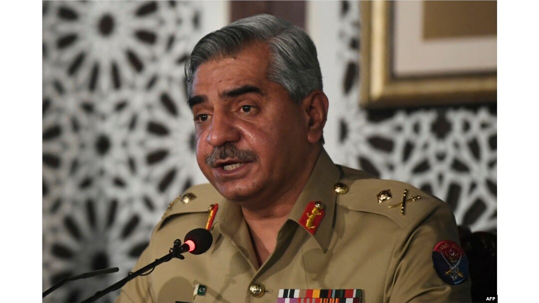 FILE - Lieutenant General Babar Iftikhar, military spokesman of Inter-Services Public Relations (ISPR), speaks during a press conference in Islamabad, Nov. 14, 2020.