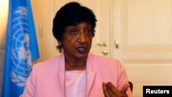 FILE - Then-outgoing U.N. Human Rights Commissioner Navi Pillay talks during an interview to Reuters in her office in Geneva, Aug. 19, 2014. 