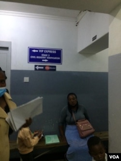 Some people processing their documents at the Registry Department in Bulawayo