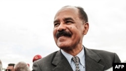 Eritrea's President Isaias Afwerki smiles upon his arrival at the airport in Gondar, for a visit in Ethiopia, on November 9, 2018.