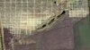 Спутниковые фотографии свидетельствуют о расширении кладбища под Мариуполем