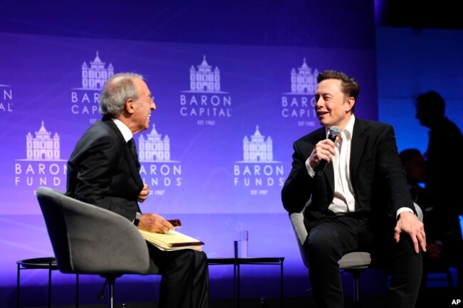 Baron Capital Group Chairman and CEO Ron Baron interviews Tesla CEO Elon Musk at the 29th Annual Baron Investment Conference in New York City on Friday, Nov. 4, 2022. (Hewes Communications, Inc. via AP)