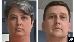 FILE - These booking photos released Oct. 9, 2021, by the West Virginia Regional Jail and Correctional Facility Authority show Diana Toebbe and Jonathan Toebbe. 