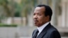 FILE — Cameroon's President Paul Biya pictured outside the Presidential Palace in Yaounde, July 26, 2022.
