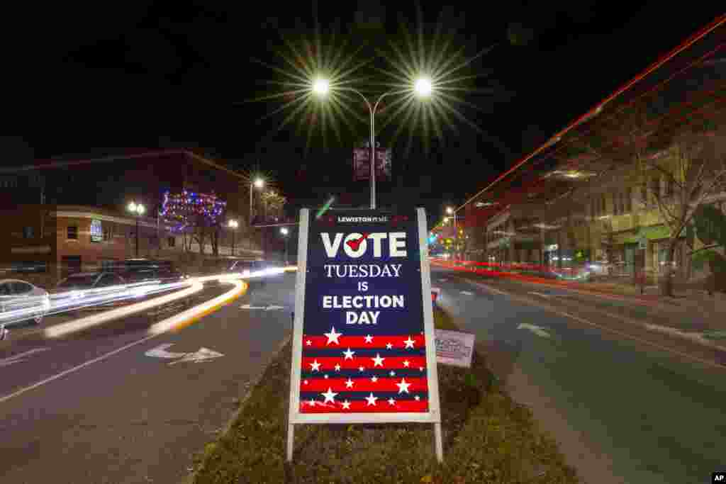 A sign reminds residents to do their civic duty on Election Day, Nov. 8, 2022, in Lewiston, Maine.