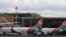FILE: November 05, 2022 photo shows Kenya Airways planes parked at Jomo Kenyatta International Airport in Nairobi. The airline says its restructuring is moving forward. 