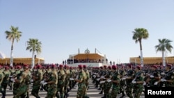 FILE - Iraqi Prime Minister Mustafa al-Kadhimi attends a military parade for the members of Iraqi Popular Mobilization Forces (PMF) marking its eighth anniversary, in Diyala province, Iraq, July 23, 2022. (Iraqi Prime Minister Media Office/Handout via Reu